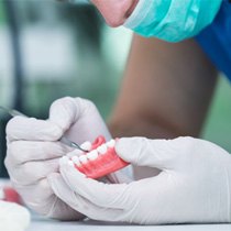 A dental technician making dentures