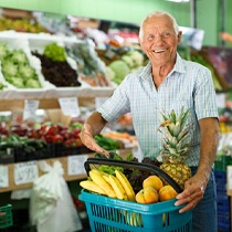 Man buying foods recommended by his implant dentist in Astoria