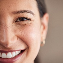 Close-up portrait of a woman with healthy teeth and gums