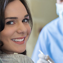 Smiling woman in dental chair