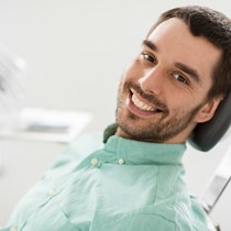 Smiling man in the dental chair