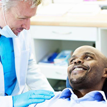 Relaxed, smiling man in dental chair