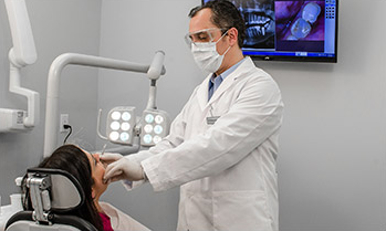 Astoria Dental Services doctor treating patient