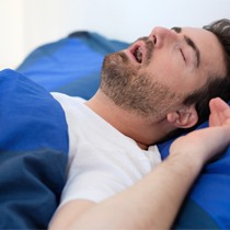 Man sleeping with his mouth open