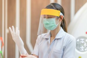 Astoria dentist prepares for appointment in COVID-19 by donning new PPE