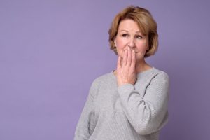 mature woman with puzzled expression